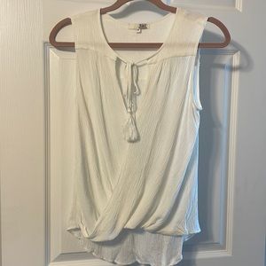 White sleeveless top